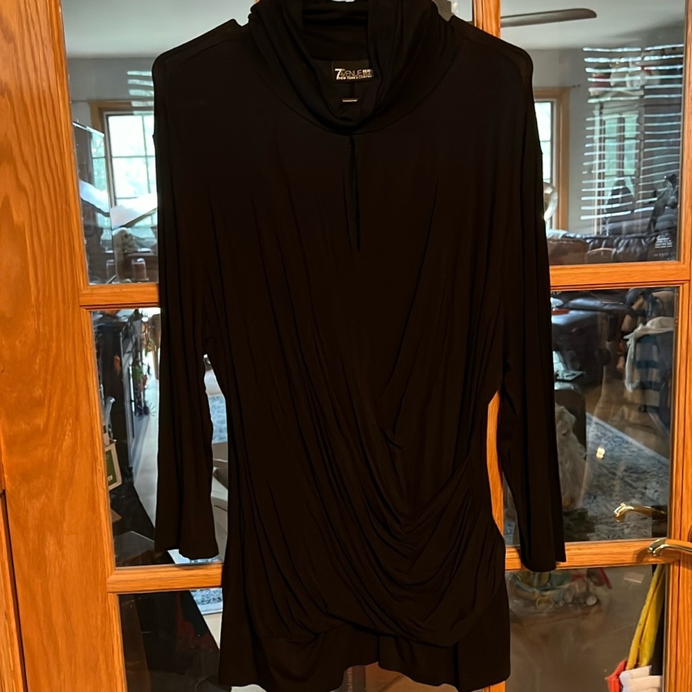 Long sleeve lightweight cris cross front with turtleneck and slit at chest